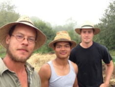Farm crew in company hats